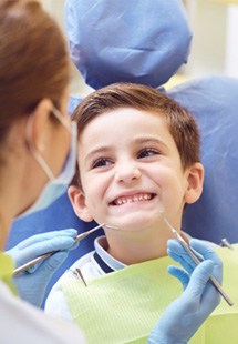 Boy smiling in the dental chair