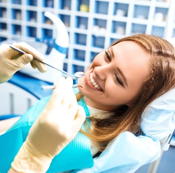 Woman receiving root canal treatment