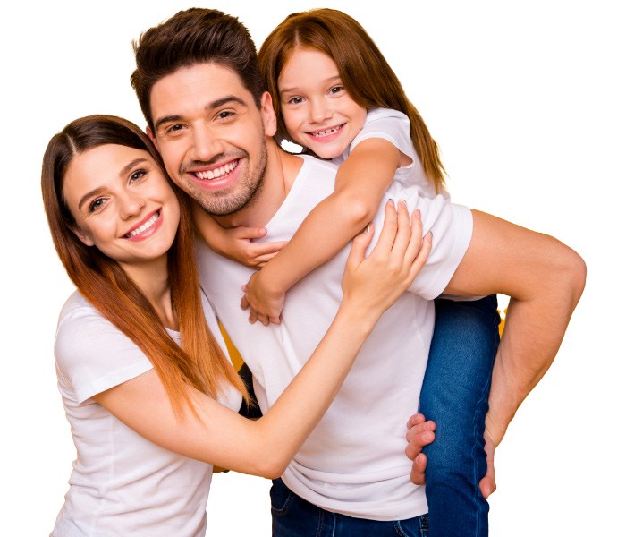 Parents and child smiling after replacing dental services in Oklahoma City