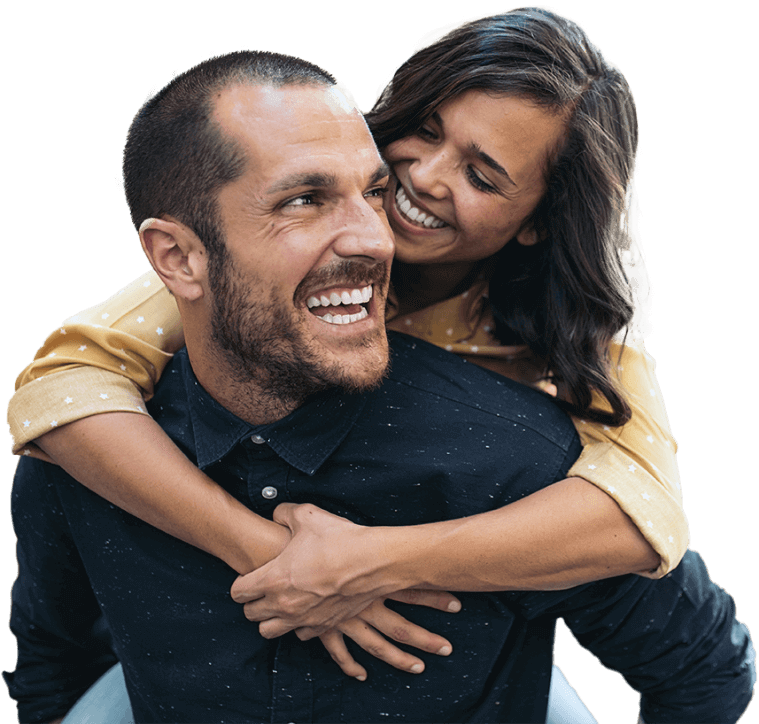 Man and woman smiling after visiting their dentist in Oklahoma City