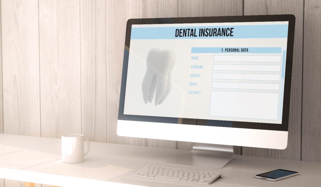 Dental insurance information on computer screen