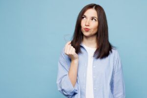 Woman wondering if she can get Invisalign after braces